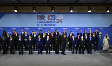 Turkish President Recep Tayyip Erdogan greets the leaders as they take part in the family photo taken at the 16th BRICS Summit in Kazan, Russia on October 24, 2024.