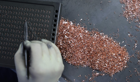 A worker is producing semiconductor products at a semiconductor manufacturing enterprise in Binzhou, East China's Shandong province, June 4, 2024