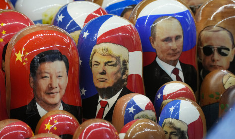 Traditional Russian wooden dolls called Matryoshka depicting China's President Xi Jinping, U.S. President-elect Donald Trump and Russian President Vladimir Putin are displayed for sale at a souvenir shop in St. Petersburg, Russia.