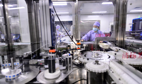 Busy production line of Northeast Pharmaceutical Group Co., Ltd. in Shenyang, Liaoning Province, China.