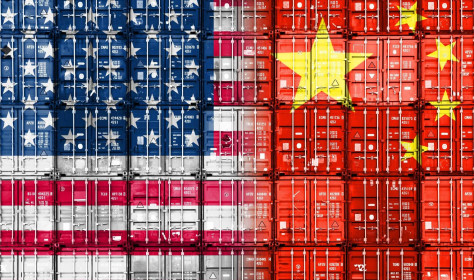 Containers with US and Chinese flags