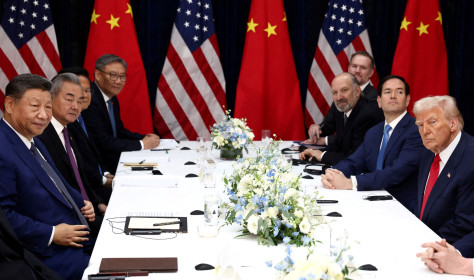 U.S. President Donald Trump, accompanied by U.S. Secretary of State Marco Rubio and U.S. Secretary of Commerce Howard Lutnick, attends a bilateral meeting with Chinese President Xi Jinping, accompanied by Chinese Foreign Minister Wang Yi, at Gimhae International Airport, on the sidelines of the Asia-Pacific Economic Cooperation (APEC) summit, in Busan, South Korea, October 30, 2025. 