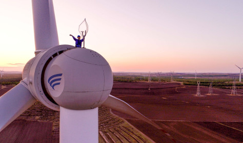 Aerial photo workers inspect equipment at a wind power photovoltaic field in Ulanhot, Hinggan League, Inner Mongolia, China, May 23, 2023