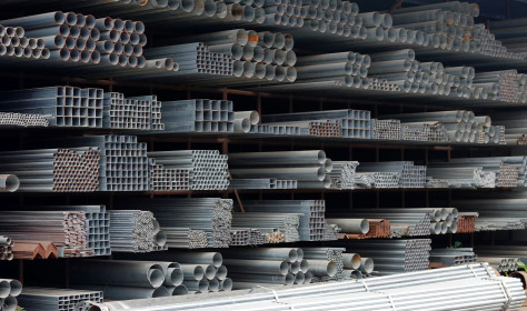 Steel products piled up in the steel market in Yichang, Hubei, China on December 13, 2025.