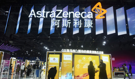 Visitors visit Astrazeneca's stand at the China International Import Expo in Shanghai