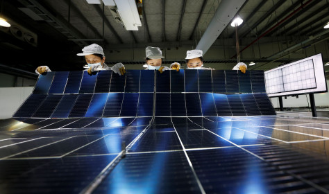 orkers are manufacturing photovoltaic module export products in the production workshop in Suqian City, Jiangsu Province, China on July 22, 2025.