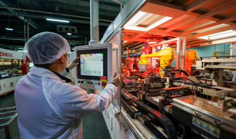 A worker is producing an export order for photovoltaic equipment on a company's production line in Sihong County Economic Development Zone, Suqian City, Jiangsu Province, China on February 24, 2026