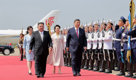 In this photo provided by the North Korean government, North Korean leader Kim Jong Un, front left, and his wife Ri Sol Ju, see off Chinese President Xi Jinping, center right, and his wife Peng Liyuan at the airport in Pyongyang, Tuesday, June 9, 2026. 