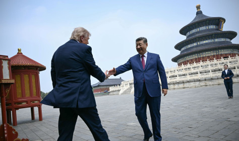 China's President Xi Jinping, right, and U.S. President Donald Trump shake hands at the Temple of Heaven in Beijing Thursday, May 14, 2026.