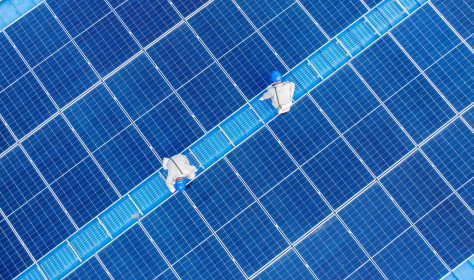 ower workers inspected the operation status of photovoltaic power generation equipment on the roof of a company in Yangzhou City, Jiangsu Province, China on June 24, 2025.