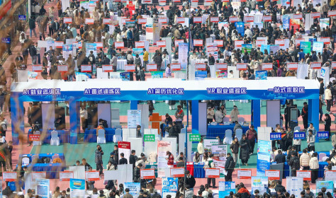 College students search for suitable positions at the Shandong University of Science and Technology campus job fair in Qingdao, Shandong Province, China on March 20, 2026.