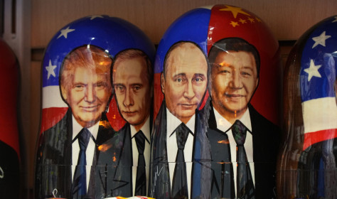 Matryoshkas, the traditional Russian wooden dolls, with images of U.S. President Donald Trump, Russian President Vladimir Putin and China's President Xi Jinping 