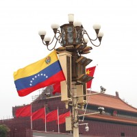 Chinese and Venezuelan flags during Nicolás Maduro's visit to China in September 2018. His challenger in the recent crisis in Venezuela, John Guaido, is also wooing China. 