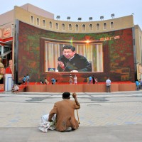 A speech by state and party leader Xi Jinping is televised in front of the Id Kah Mosque in Kashgar, Xinjiang.