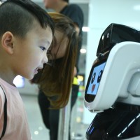 Chinese boy and robot