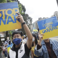 Ukrainian nationals in Taiwan and supporters protest against the invasion of Russia during a march in Taipei, Taiwan