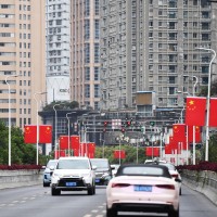 Five-star red flags are hung on a viaduct to welcome the upcoming National Day in Guiyang.