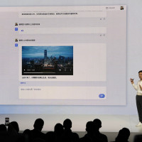 Baidu CEO Robin Li introduces the functions of Ernie Bot during an event in Beijing, Thursday, March 16, 2023.