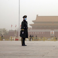 Police officers are seen at Tiananmen Square in Beijing, China