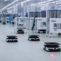 Smart robots operate at a workshop of Ronma Solar in Jinhua City, east China's Zhejiang Province, Feb. 19, 2024. Factories across China have gradually resumed operations as the country's most celebrated holiday Spring Festival ends. 