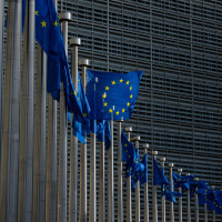 European flags in front of the European Commission headquarters in Brussels.
