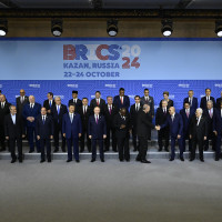 Turkish President Recep Tayyip Erdogan greets the leaders as they take part in the family photo taken at the 16th BRICS Summit in Kazan, Russia on October 24, 2024.