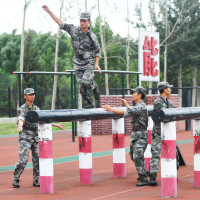 Chinese soldiers take part in a training session at the Academy of Armored Forces Engineering of the Peoples Liberation Army (PLA) in Beijing, China, 22 July 2014.