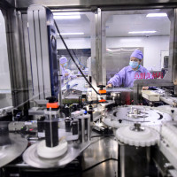 Busy production line of Northeast Pharmaceutical Group Co., Ltd. in Shenyang, Liaoning Province, China.