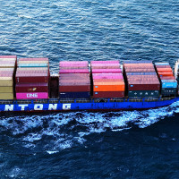  A cargo ship loaded with foreign trade containers sails out of the port of Qingdao in Shandong province, China on March 18, 2025.