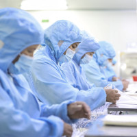 Workers make medical infusion sets for export at a workshop in Huai 'an City, Jiangsu Province, China