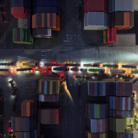 Trucks line up to depart from a container terminal in Nanjing in east China's Jiangsu province on Tuesday, April 8, 2025.