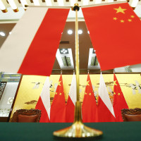 Poland and Chinese flags