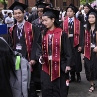 Students proceed through Harvard Yard during commencement ceremonies at Harvard University, Thursday, May 29, 2025, in Cambridge, Mass. 