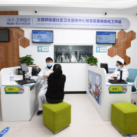  At the Smart Vaccine automation workstation of the community Health Service center, medical staff inoculate people with the nine-valent HPV vaccine in Guiyang, Guizhou province, China, March 14, 2024.