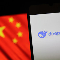 eepseek logo is seen displayed on a smartphone with a Flag of China in the background