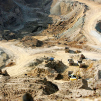 An excavator loads trucks with rare earth at a mine in Mojiang Hani Autonomous County, Simao city, southwest Chinas Yunnan province, 18 March 2008. 