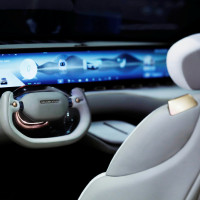 Interior of the SKYWORTH Y with a view of the large flat screen on the dashboard