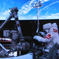 Beijing Aerospace Control Center shows Shenzhou-20 astronaut Chen Zhongrui performing extravehicular activities outside China's orbiting space station on June 26, 2025.