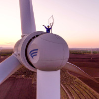 Aerial photo workers inspect equipment at a wind power photovoltaic field in Ulanhot, Hinggan League, Inner Mongolia, China, May 23, 2023