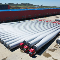 A drone photo shows wind turbine blades at the Mingyang New Energy Intelligent Manufacturing Industrial Park in Baotou, north China's Inner Mongolia Autonomous Region, July 29, 2025.