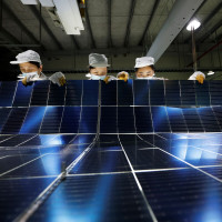 orkers are manufacturing photovoltaic module export products in the production workshop in Suqian City, Jiangsu Province, China on July 22, 2025.