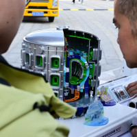 People view a model of the Burning Plasma Experimental Superconducting Tokamak (BEST)