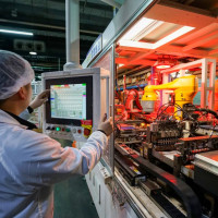 A worker is producing an export order for photovoltaic equipment on a company's production line in Sihong County Economic Development Zone, Suqian City, Jiangsu Province, China on February 24, 2026