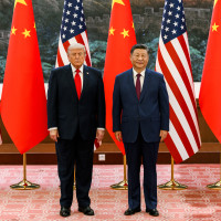 US President Donald Trump participates in a welcoming ceremony with Chinese President Xi Jinping at the Great Hall of the People in Beijing