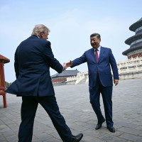 China's President Xi Jinping, right, and U.S. President Donald Trump shake hands at the Temple of Heaven in Beijing Thursday, May 14, 2026.