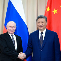 In this photo released by Xinhua News Agency, Chinese President Xi Jinping, right, meets with Russian President Vladimir Putin on the sidelines of the Shanghai Cooperation Organization Summit 2026 in Bishkek, Kyrgyzstan, Monday, Aug. 31, 2026. 
