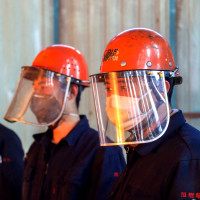 Chinese workers survey the production of steel at a plant of Qingdao Special Iron and Steel Co., Ltd. in Qingdao city.
