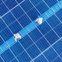 ower workers inspected the operation status of photovoltaic power generation equipment on the roof of a company in Yangzhou City, Jiangsu Province, China on June 24, 2025.