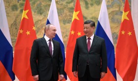 Chinese President Xi Jinping, right, and Russian President Vladimir Putin pose for a photo prior to their talks in Beijing.
