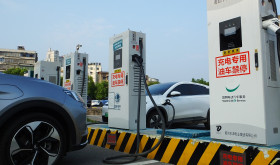 A new energy electric vehicle charging pile is seen in Yichang, Hubei province, China, July 31, 2022.